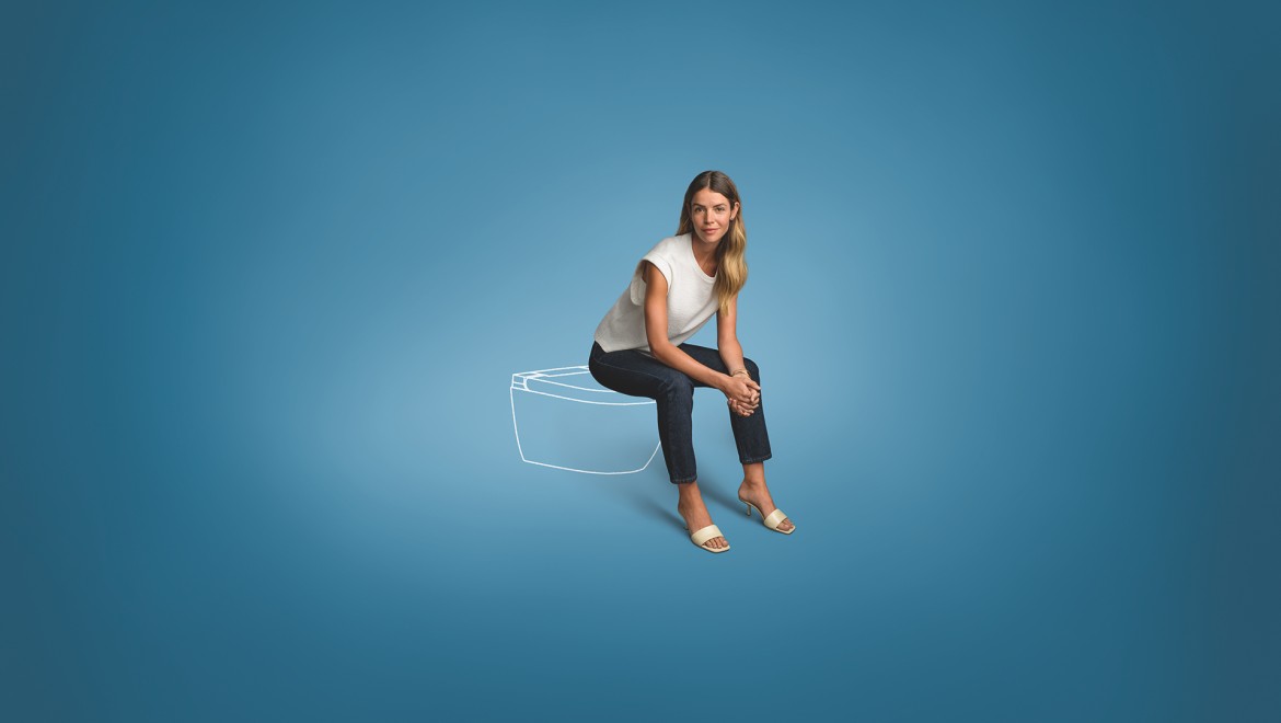 Illustration mit Frau und Geberit AquaClean Alba