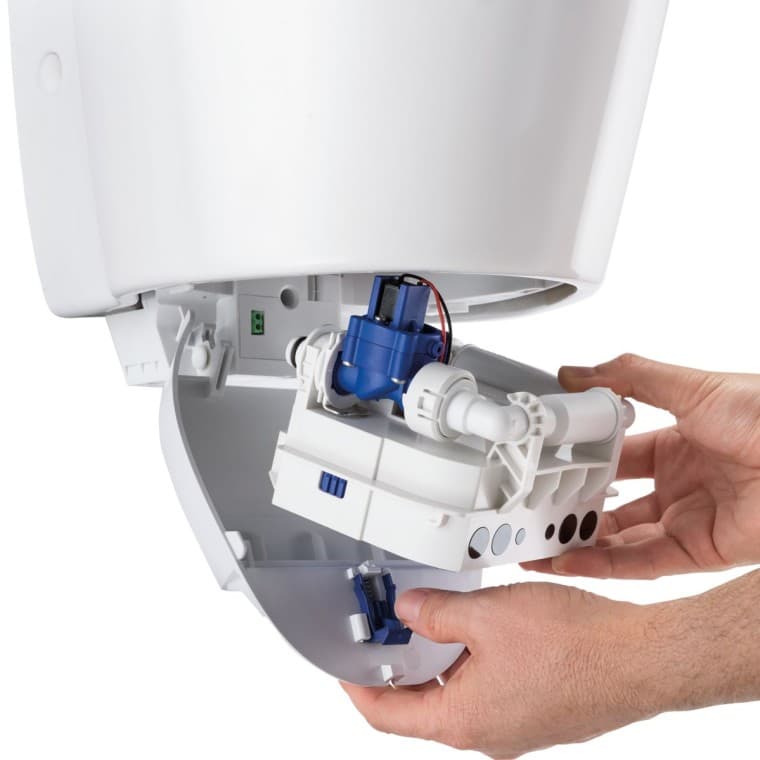 Geberit Urinal-Steuereinheit in einer Dockingstation Geberit Urinal-Steuereinheit in einer Dockingstation